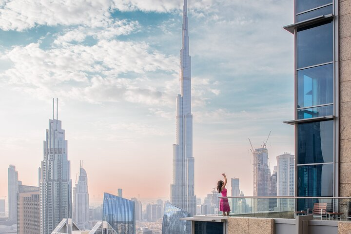 Experience the stunning skyline of Dubai featuring the iconic Burj Khalifa while enjoying a leisurely moment amidst the blend of modern architecture and cultural richness.